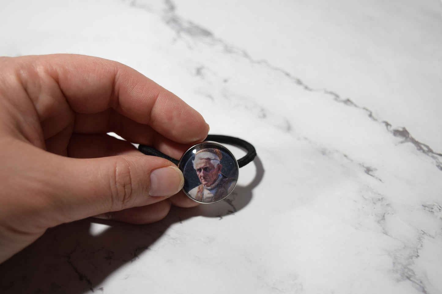 catholic hair tie