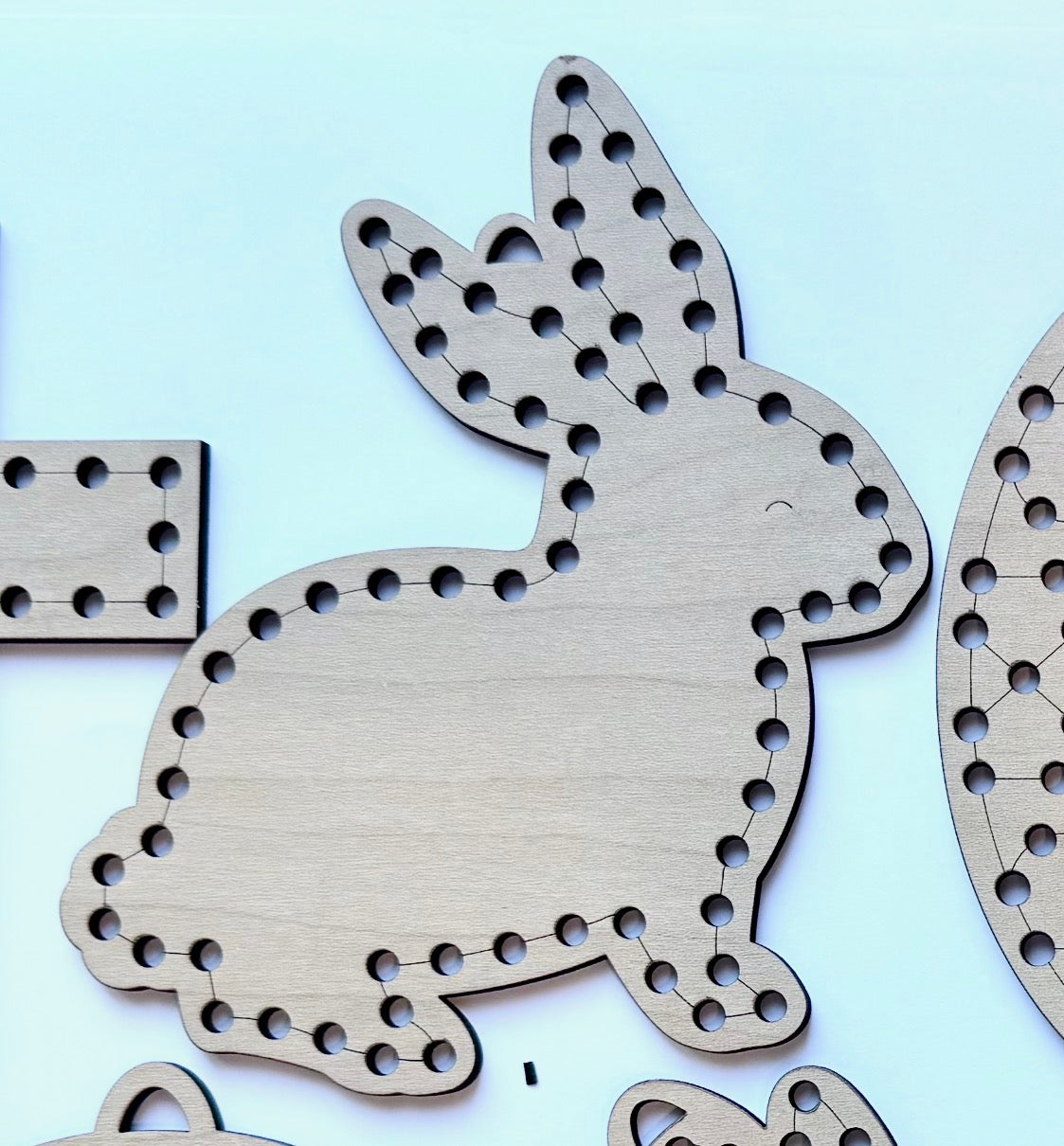 Kids Easter Wooden lacing craft kit with bunny, egg, carrot, rainbow, and cross shapes